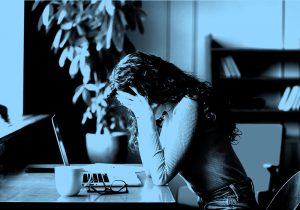 woman stressed at desk